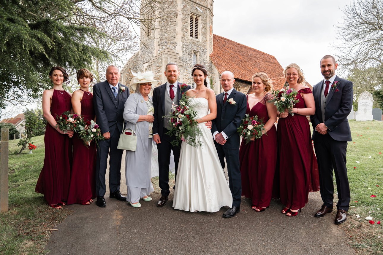 A family group portrait outside St Peter and St Paul's in Hockley, Essex. 