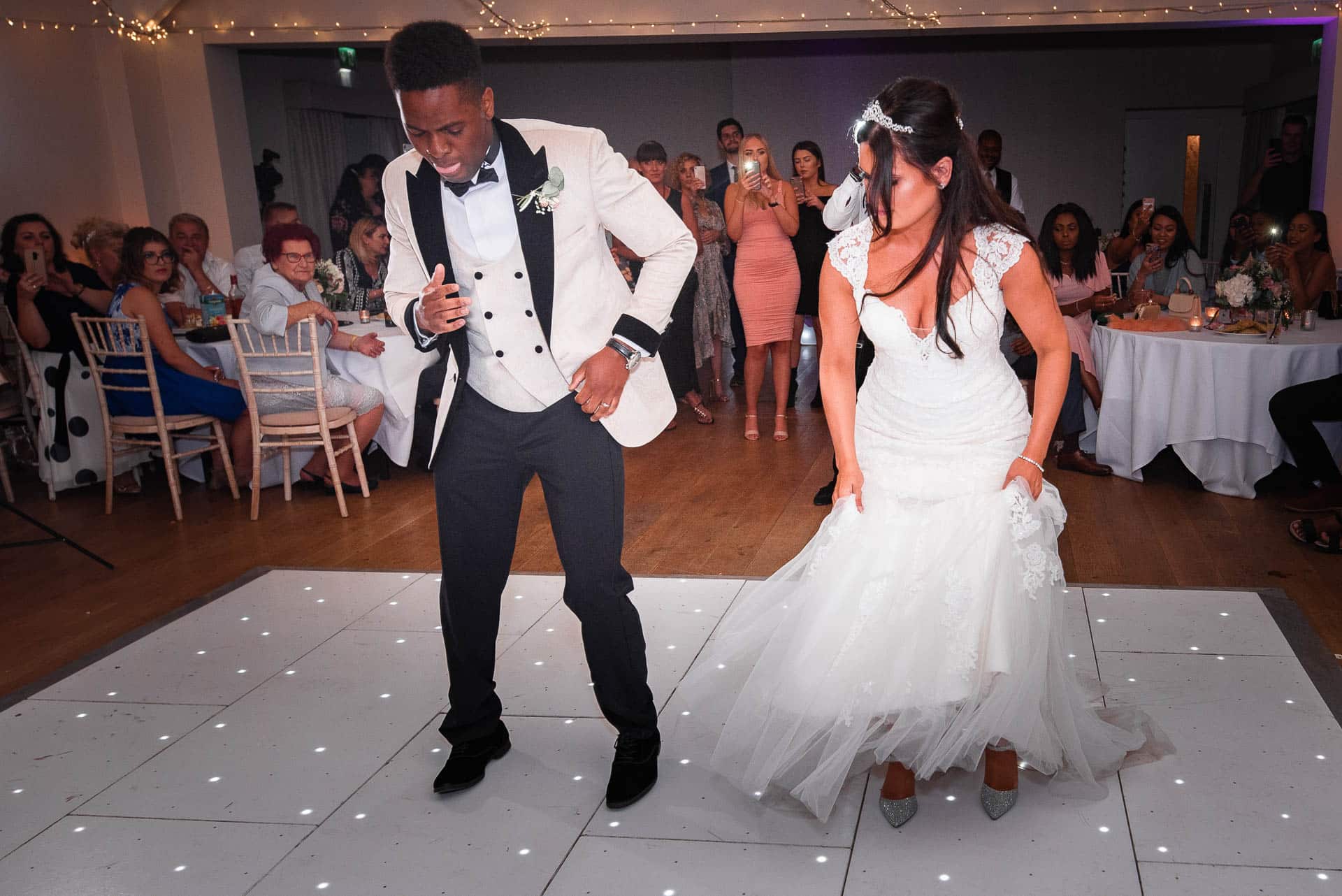 bride-groom-on-white-dance-floor