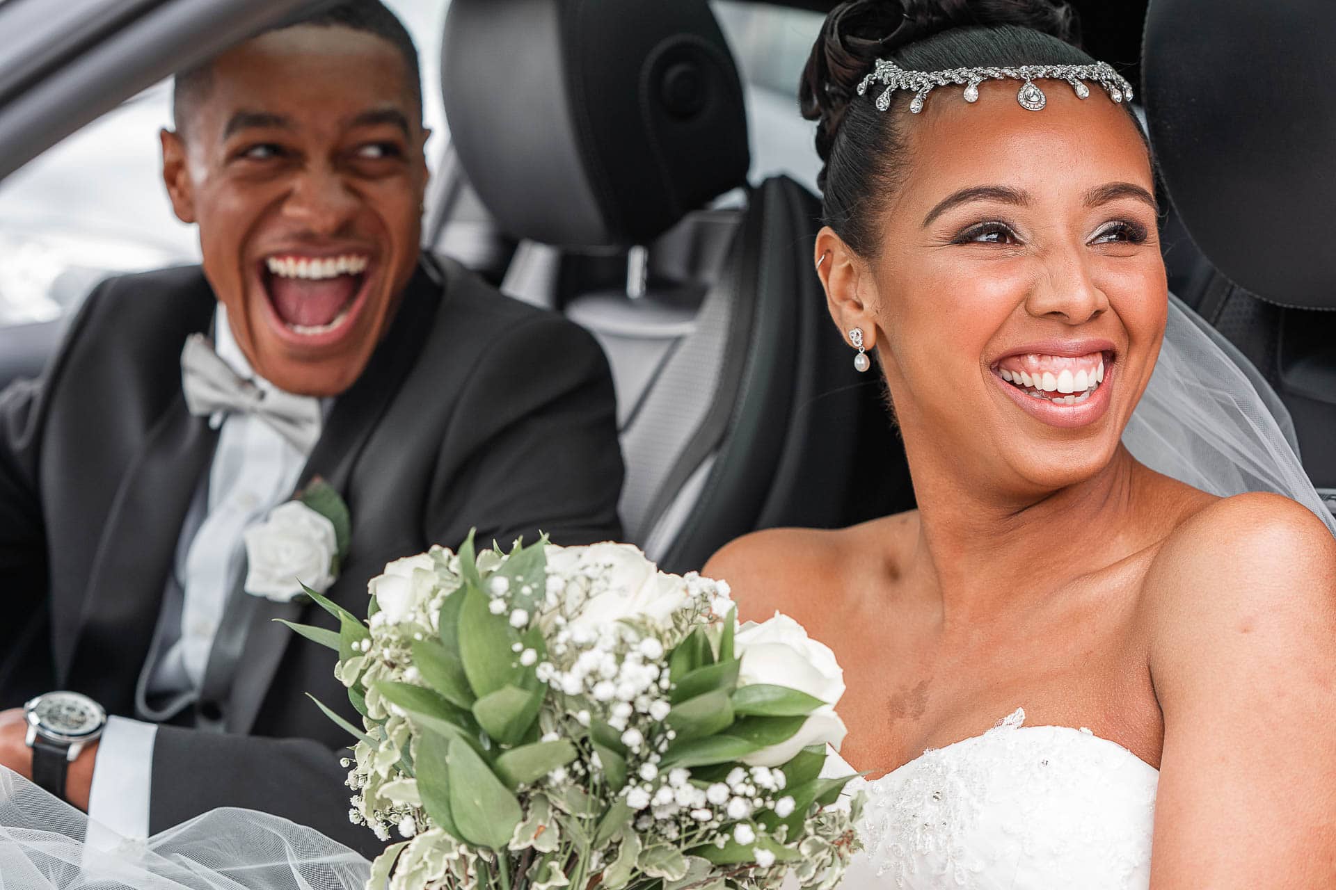 couple-in-car-smiling-at-the-church