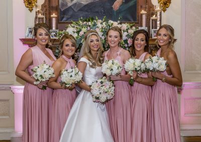 bride-and-bridesmaids-in-pink-dresses-group-portrait