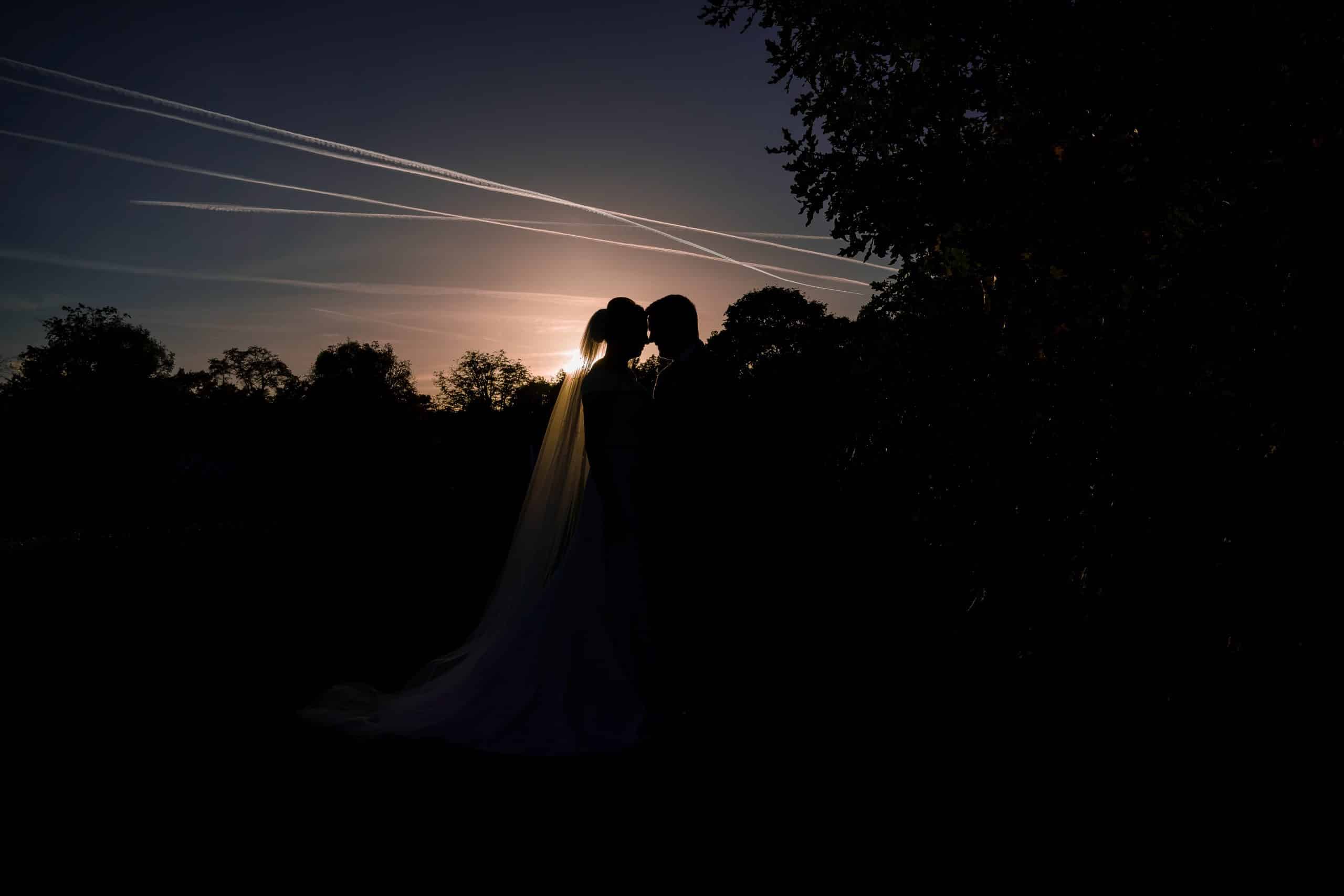 bride-and-groom-in-beautiful-sunset